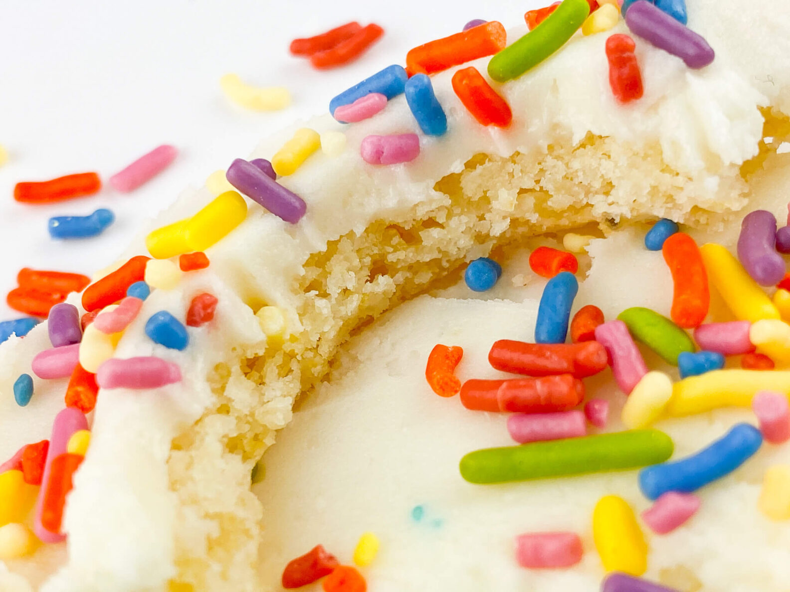 Kate's Safe and Sweet - Frosted Cookies with Sprinkles Biten
